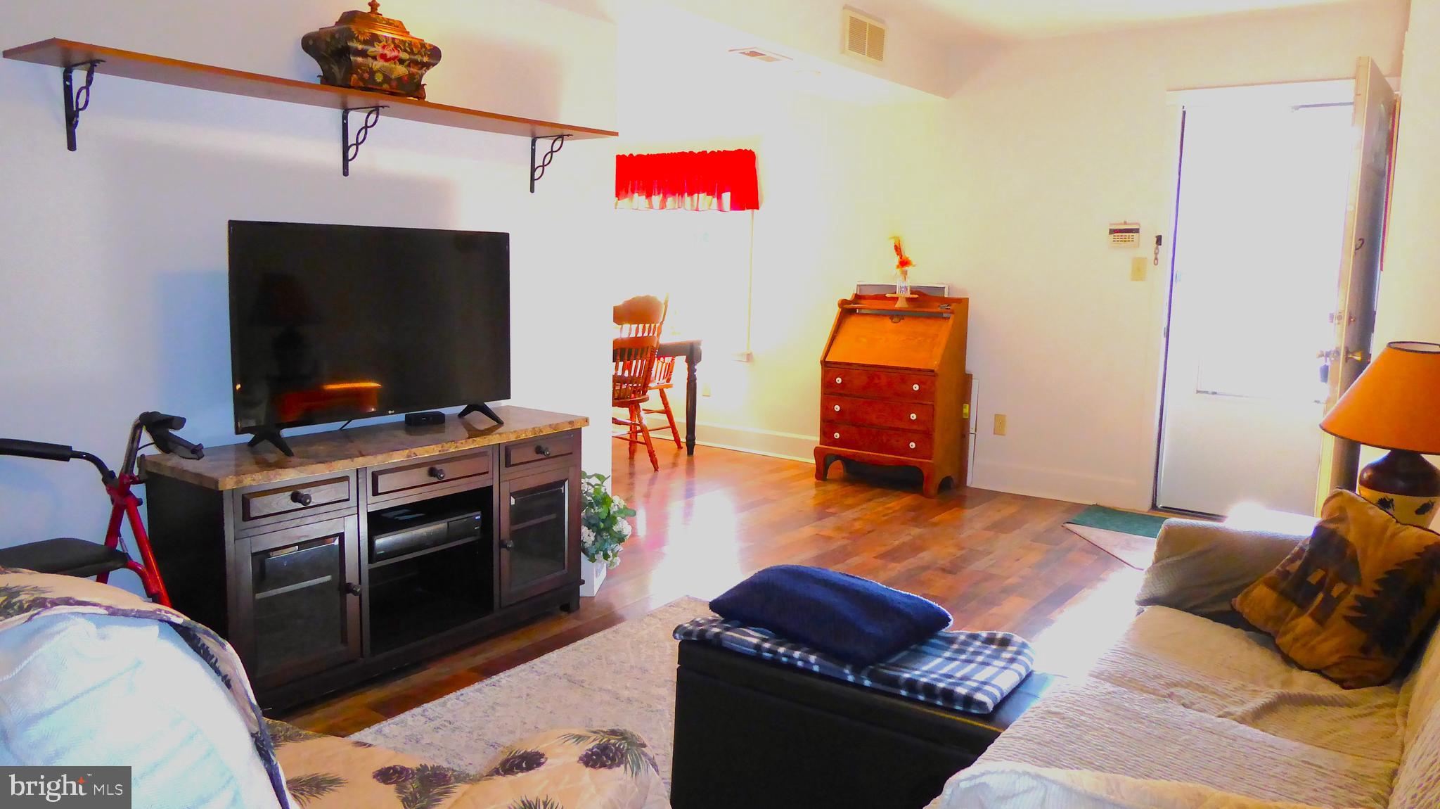 110 Daffodil Road Millville, NJ 08332 - Photo 7 of 37 a living room with furniture and a flat screen tv