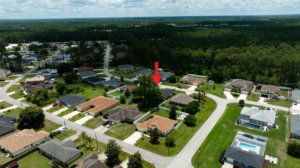 11 Riddle Drive Palm Coast, FL 32164 - Photo 30 of 33 a view of a house with a garden