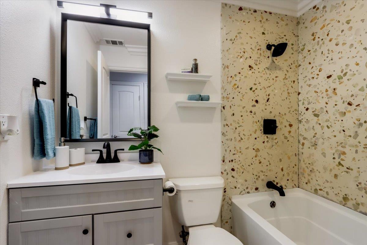 2284 Fallingtree Drive San Jose, CA 95131 - Photo 16 of 32 a bathroom with a sink a toilet and shower