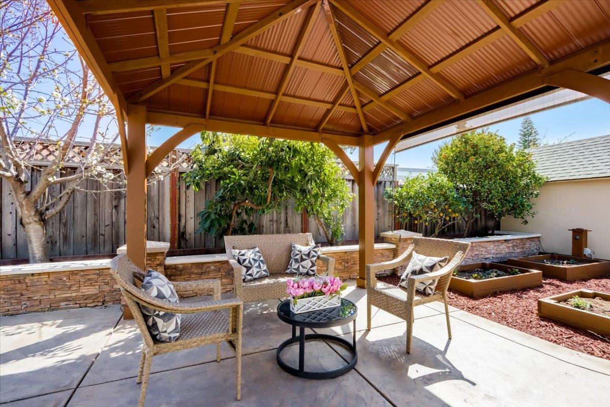 2284 Fallingtree Drive San Jose, CA 95131 - Photo 19 of 32 a patio with a patio table and chairs