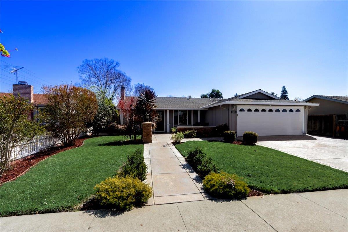 2284 Fallingtree Drive San Jose, CA 95131 - Photo 26 of 32 a front view of a house with a yard