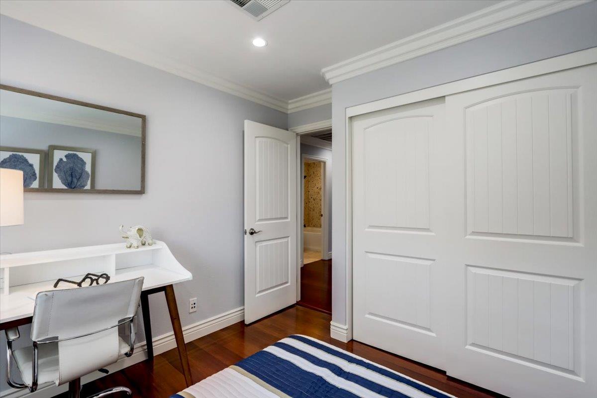 2284 Fallingtree Drive San Jose, CA 95131 - Photo 8 of 32 a room with chair and wooden floor