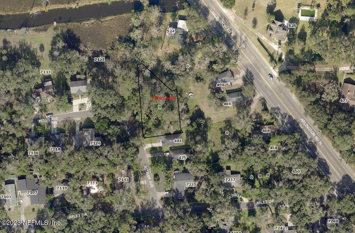 487 Nitram Street Jacksonville, FL 32211 - Photo 5 of 5 a view of a forest with a building