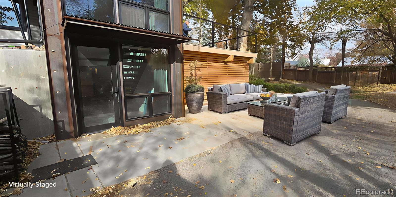 2940 19th Street Boulder, CO 80304 - Photo 13 of 13 a backyard of a house with sofas fire pit and couches