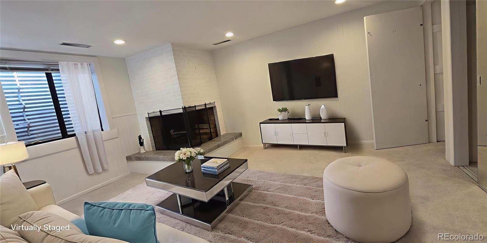 2940 19th Street Boulder, CO 80304 - Photo 7 of 13 a living room with furniture and a flat screen tv