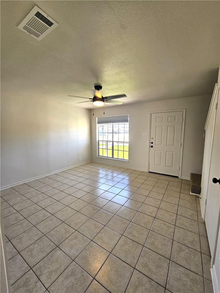 4802 Delwood Street, Unit 3 Corpus Christi, TX 78413 - Photo 2 of 22 a view of an empty room and window
