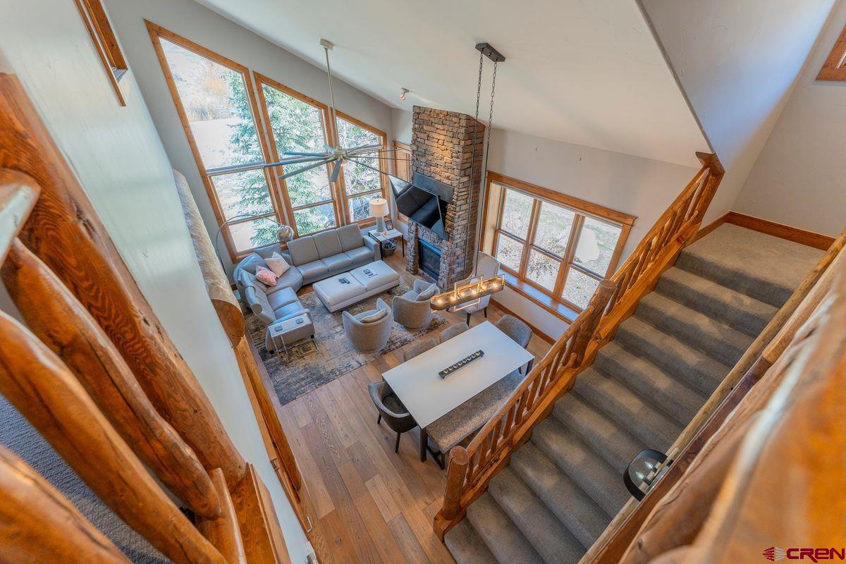 9 Hunter Hill Road, Unit 208 Crested Butte, CO 81225 - Photo 18 of 45 a living room with furniture and a floor to ceiling window