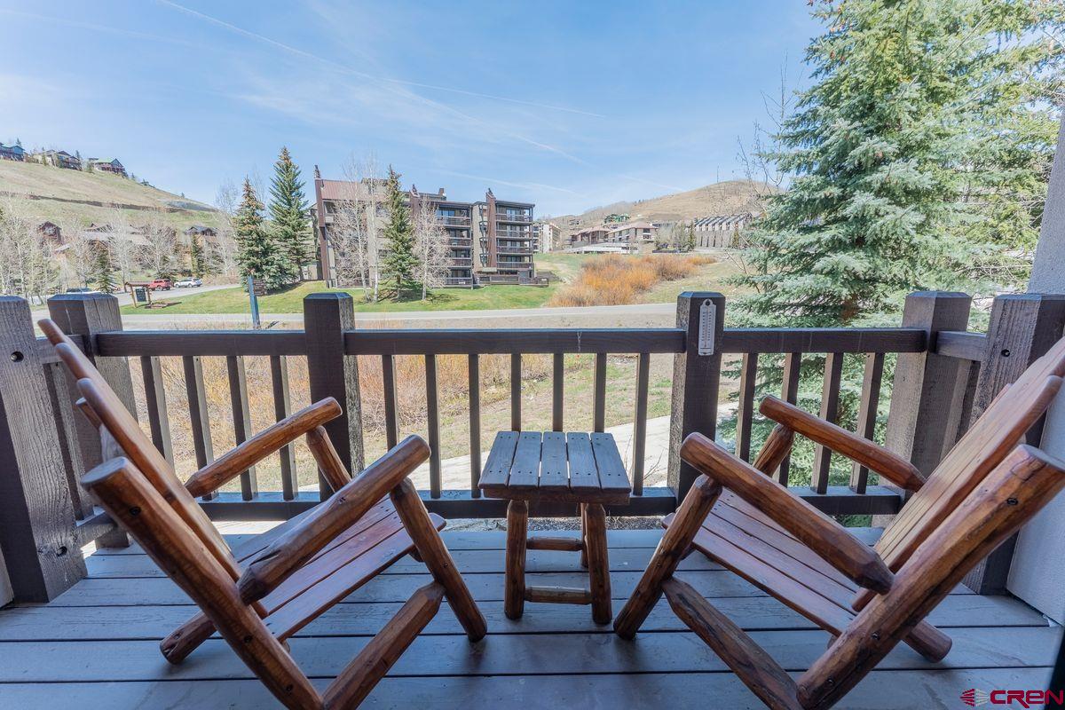 9 Hunter Hill Road, Unit 208 Crested Butte, CO 81225 - Photo 6 of 45 a view of a two chairs in the roof deck