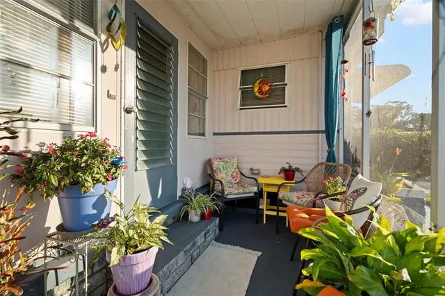 a bedroom with a bed and a dresser in it
