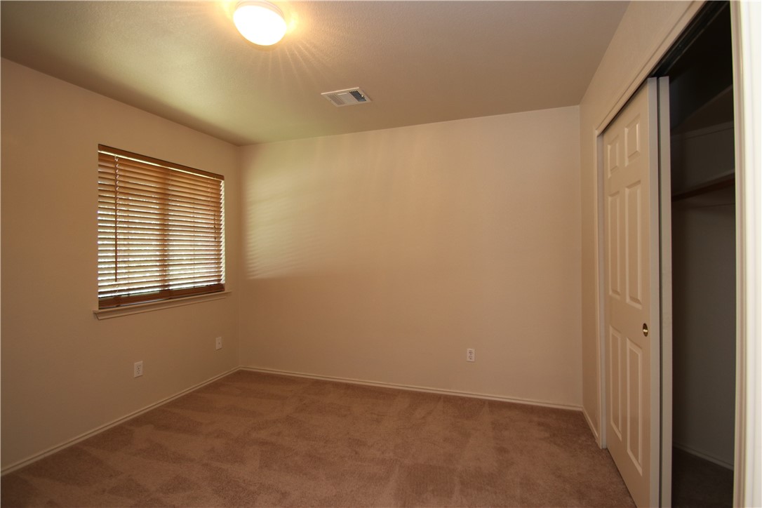16516 Fowler Mill Cove Austin, TX 78717 - Photo 14 of 27 a view of an empty room with a window