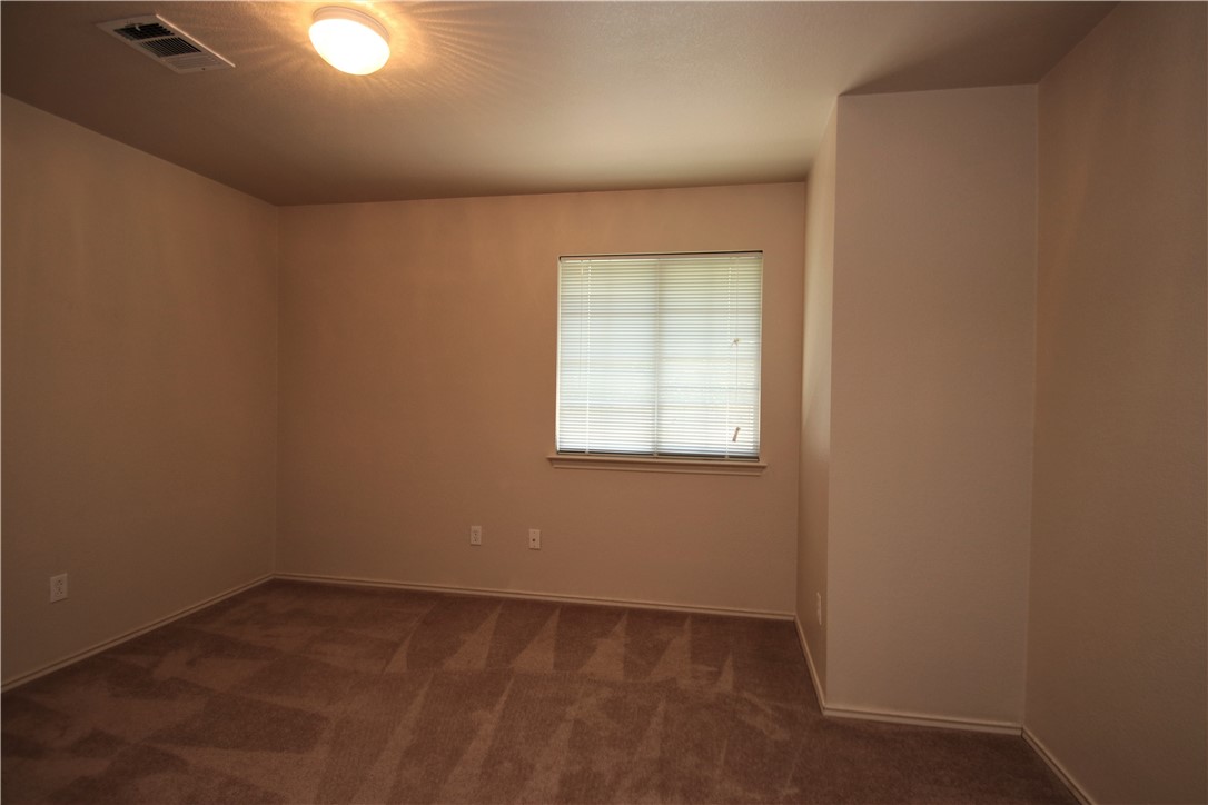 16516 Fowler Mill Cove Austin, TX 78717 - Photo 15 of 27 an empty room with a window