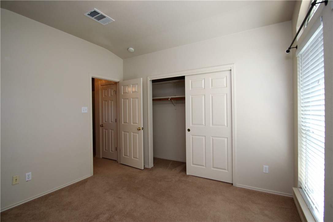 16516 Fowler Mill Cove Austin, TX 78717 - Photo 16 of 27 an empty room with closet