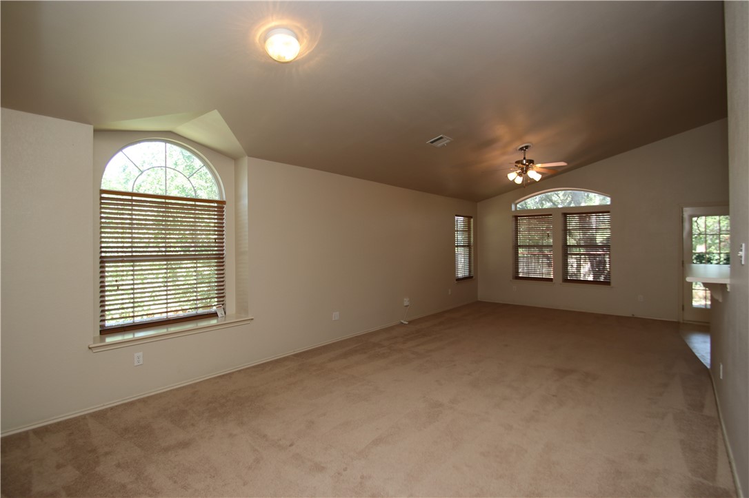 16516 Fowler Mill Cove Austin, TX 78717 - Photo 9 of 27 an empty room with windows and closet
