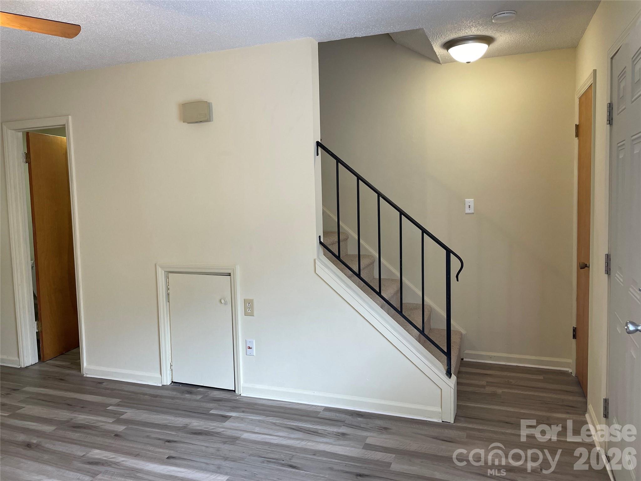 118 Ross Street, Unit A2 Morganton, NC 28655 - Photo 2 of 2 a view of a hallway with wooden floor