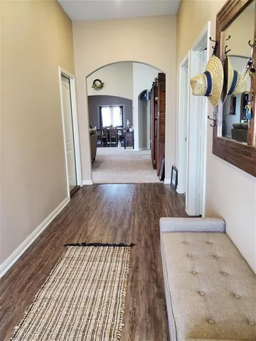 a view of a living room and bathroom
