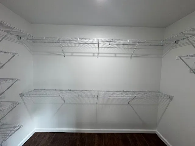 a view of a room with racks on the wall