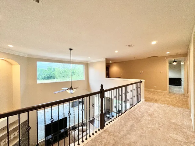 a view of hallway with a porch