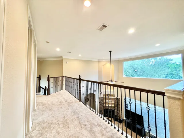 a view of hallway with stairs