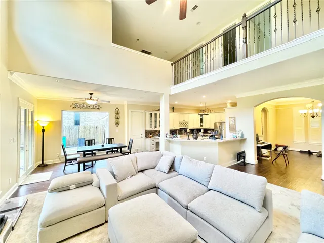 a living room with furniture and a table