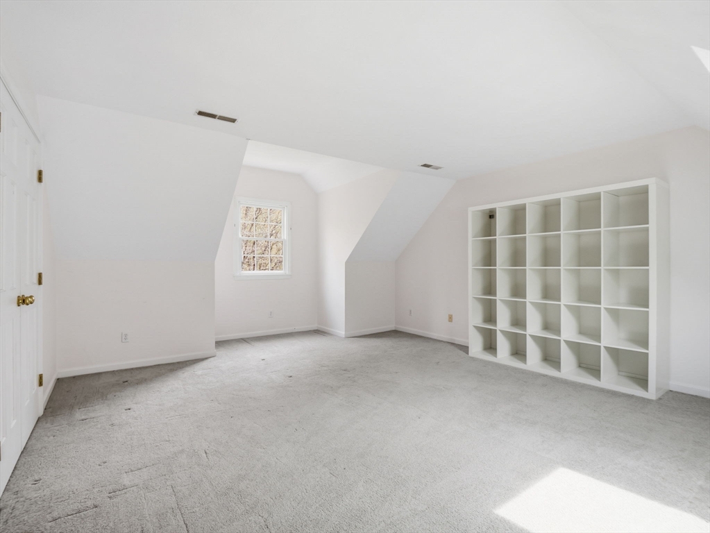 10 Hawk Ridge Road Andover, MA 01810 - Photo 24 of 32 an empty room with a window