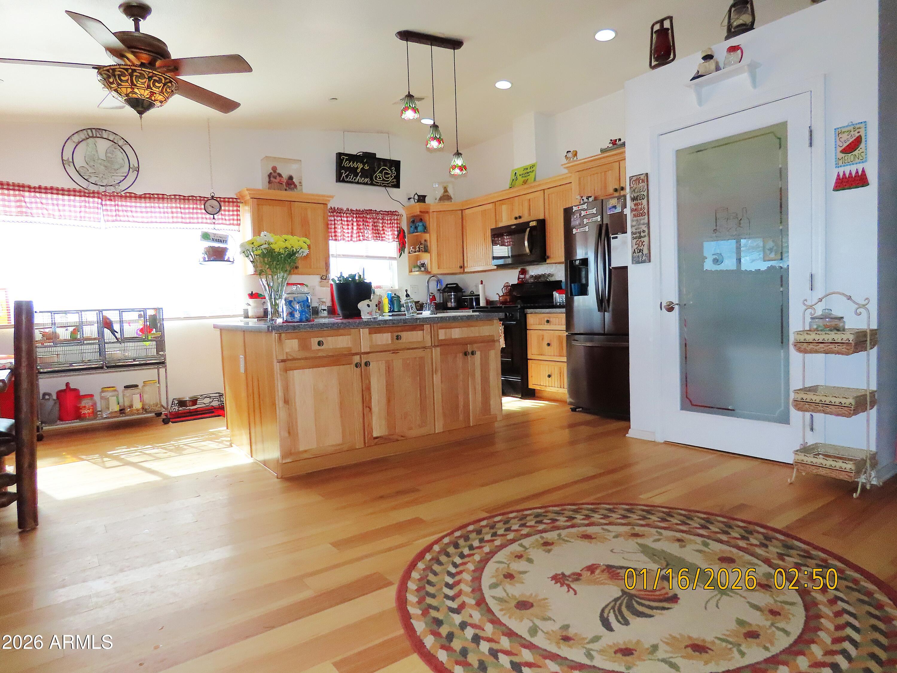 311 North Saddle Vista Road Benson, AZ 85602 - Photo 17 of 36 a view of a kitchen and dining room