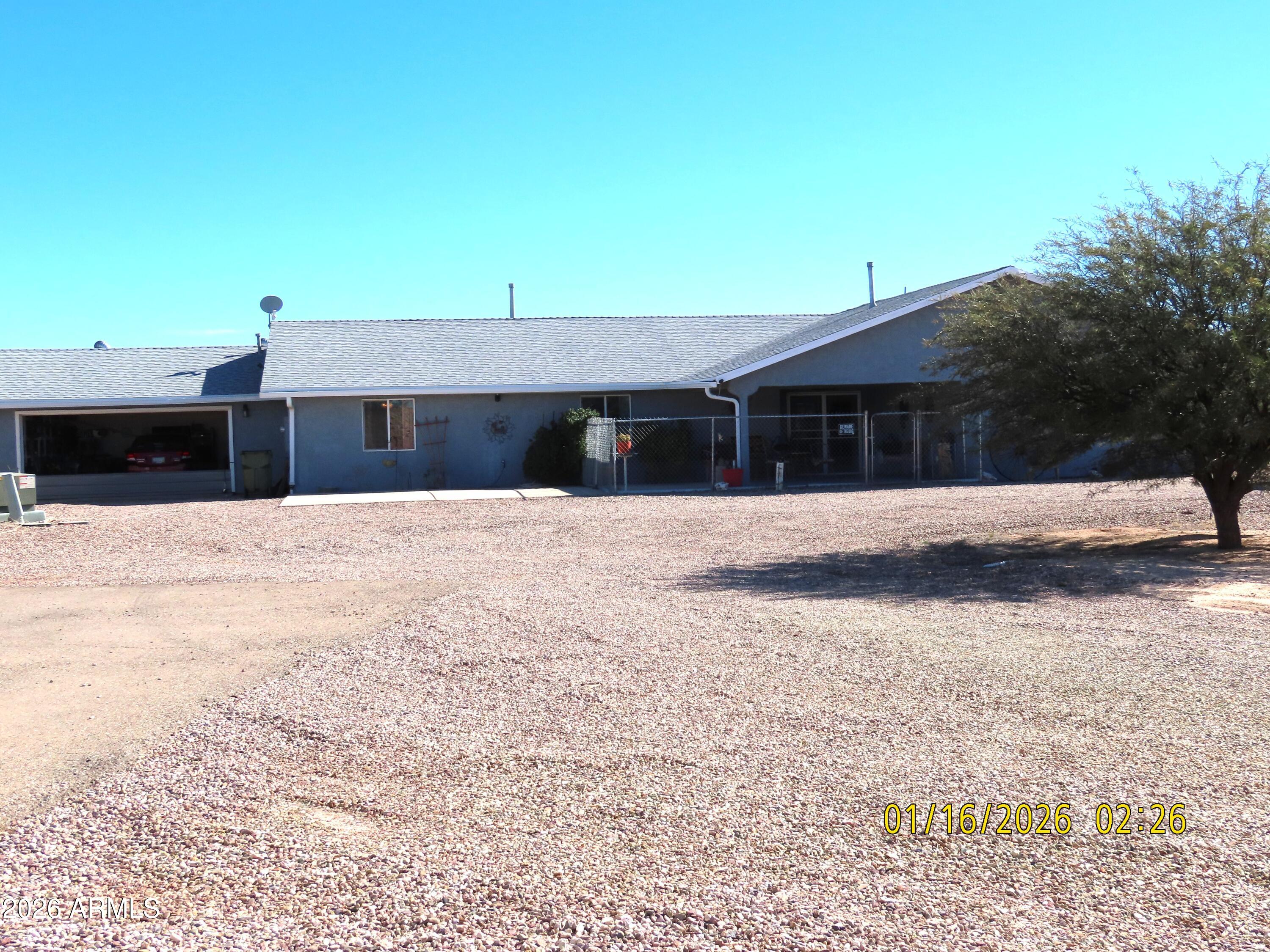 311 North Saddle Vista Road Benson, AZ 85602 - Photo 3 of 36 a view of a house with a outdoor space