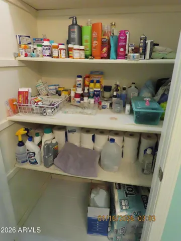 a room with lots of different colored cloths