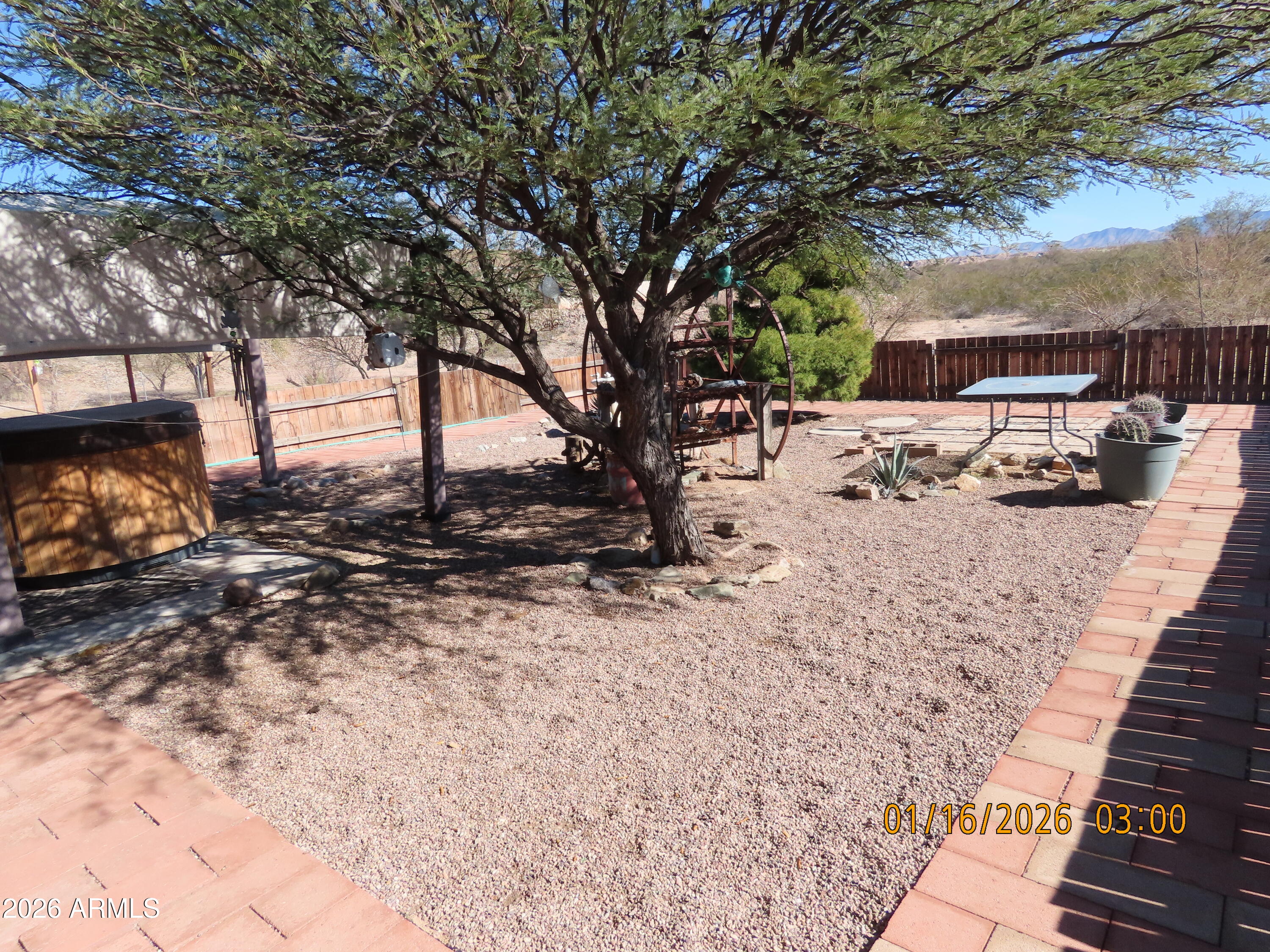 311 North Saddle Vista Road Benson, AZ 85602 - Photo 9 of 36 a view of a backyard of the house