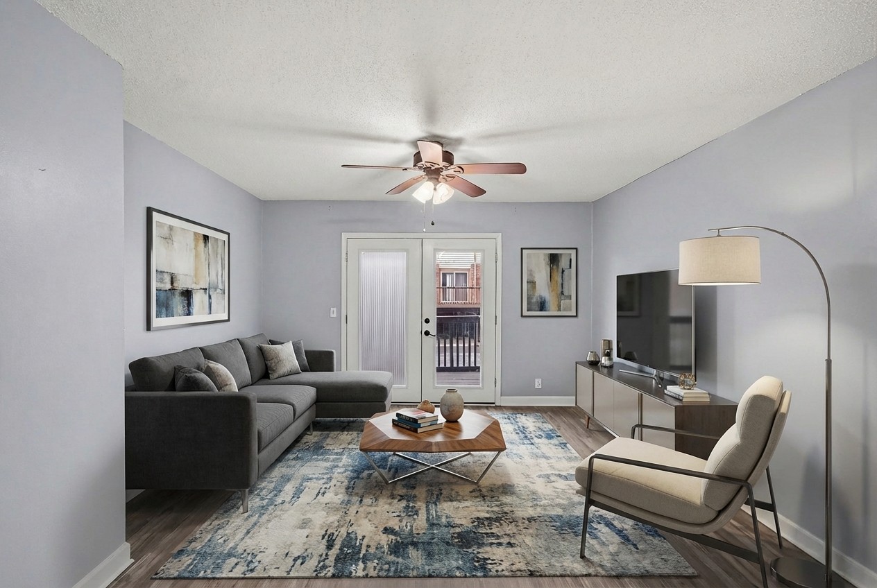a living room with furniture and a flat screen tv