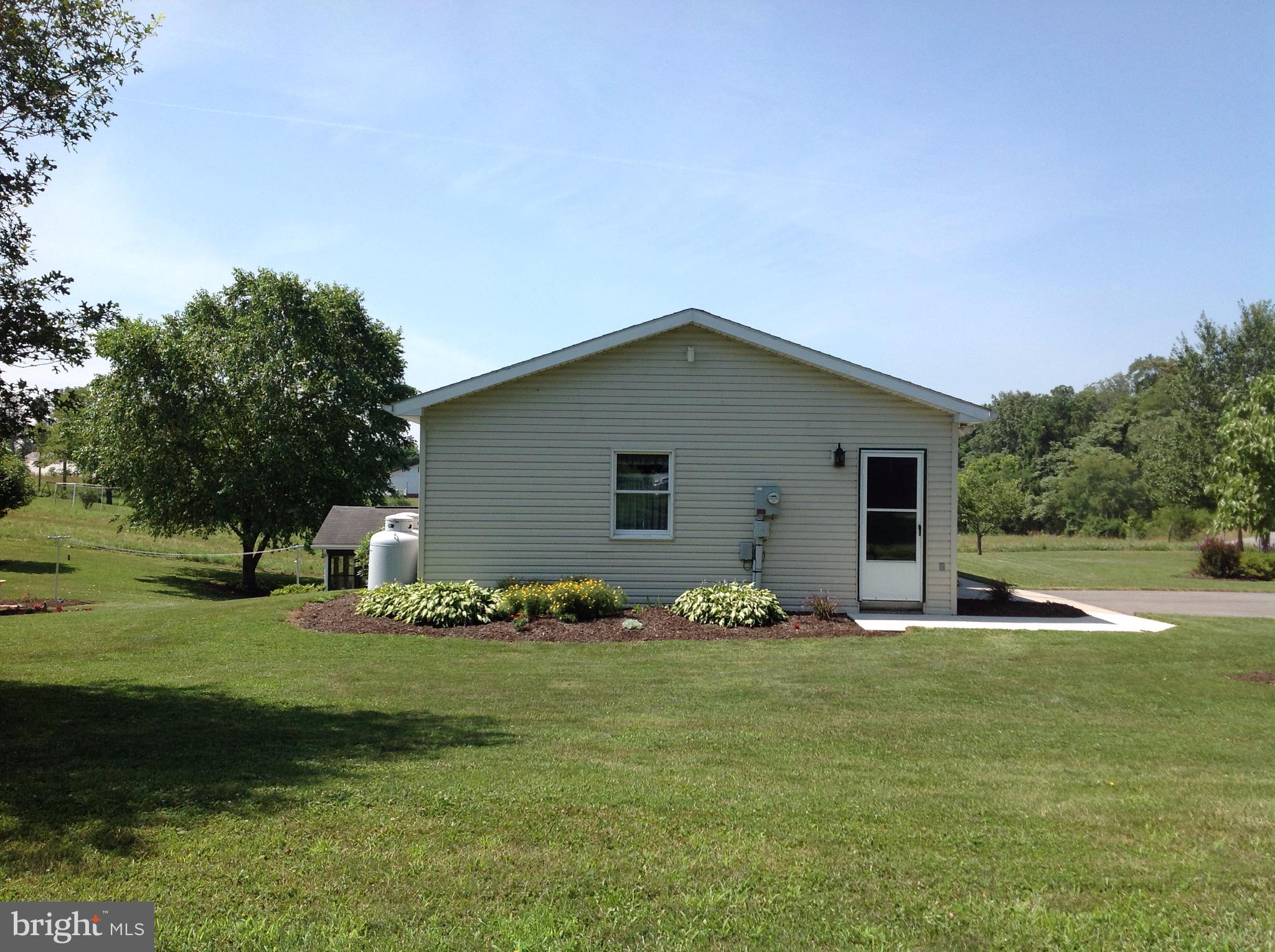 255 Ebenezer Road Halifax, PA 17032 - Photo 5 of 63 a house with garden in front of it
