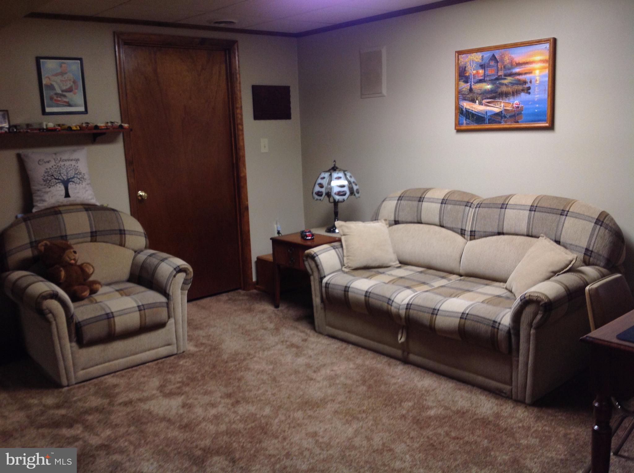 255 Ebenezer Road Halifax, PA 17032 - Photo 43 of 63 a living room with furniture and a couch