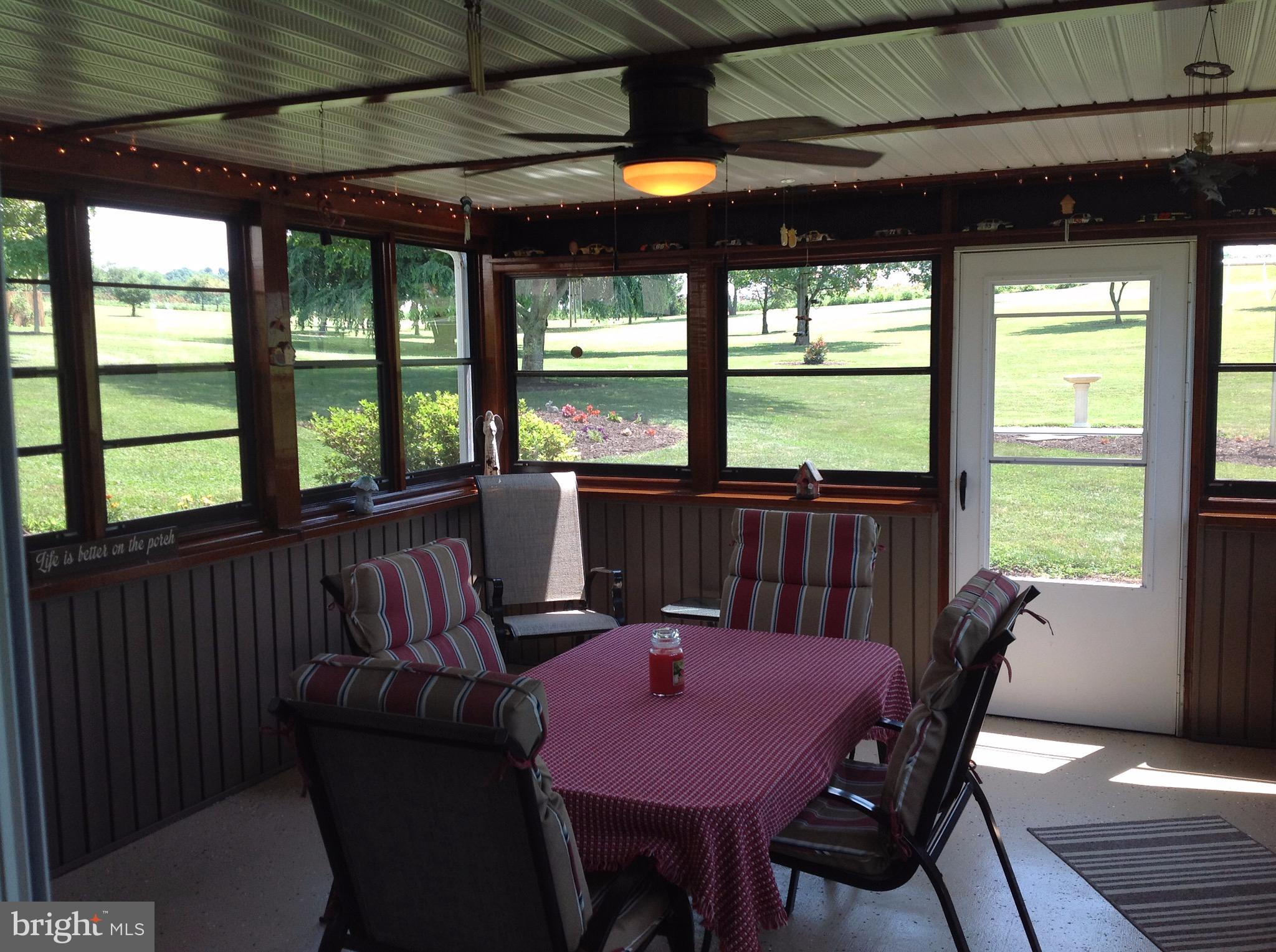 255 Ebenezer Road Halifax, PA 17032 - Photo 50 of 63 a view of a dining room with furniture window and outside view