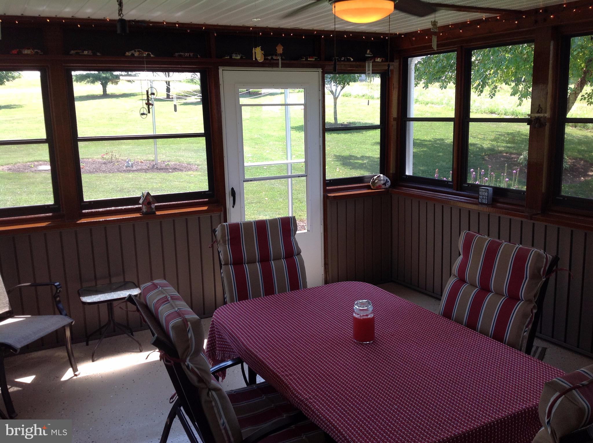 255 Ebenezer Road Halifax, PA 17032 - Photo 51 of 63 a view of a dining room with furniture window and outside view