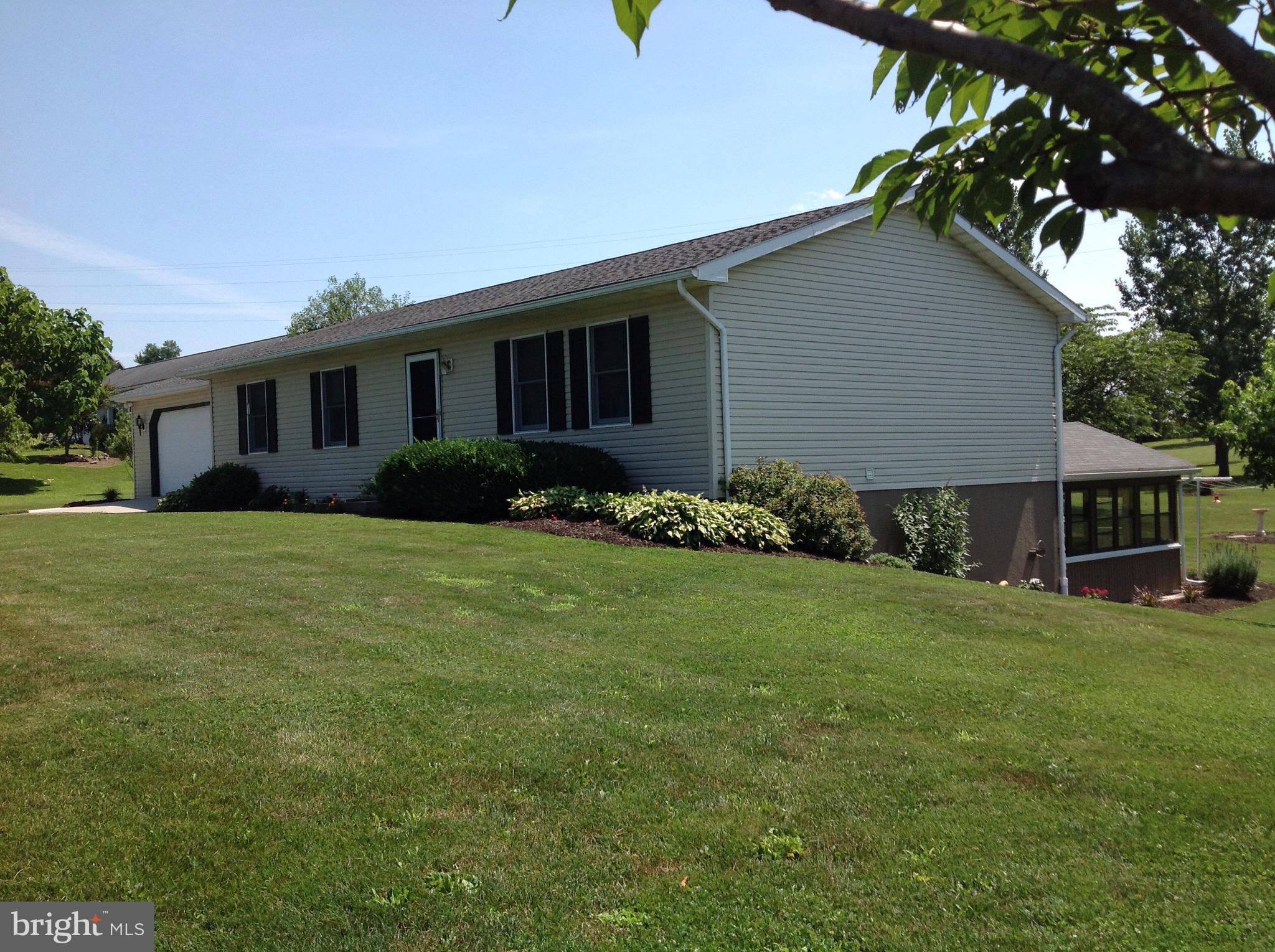255 Ebenezer Road Halifax, PA 17032 - Photo 9 of 63 a front view of house with yard and green space