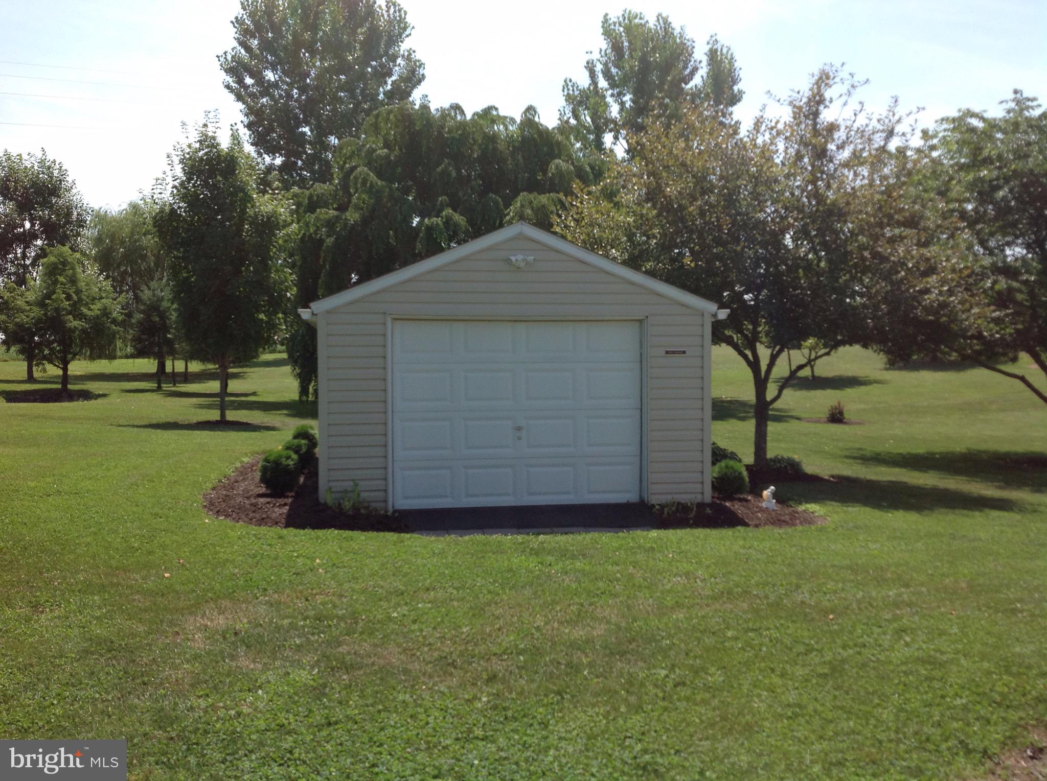 255 Ebenezer Road Halifax, PA 17032 - Photo 10 of 63 a front view of a house with garden