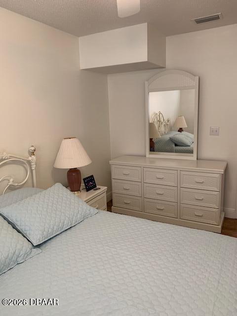 49 Rivocean Drive Ormond Beach, FL 32176 - Photo 9 of 22 a bedroom with a large bed and a dresser