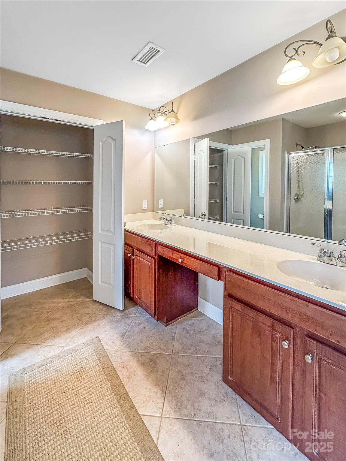 1625 Damascus Circle Conover, NC 28613 - Photo 19 of 40 a spacious bathroom with a tub sink and mirror