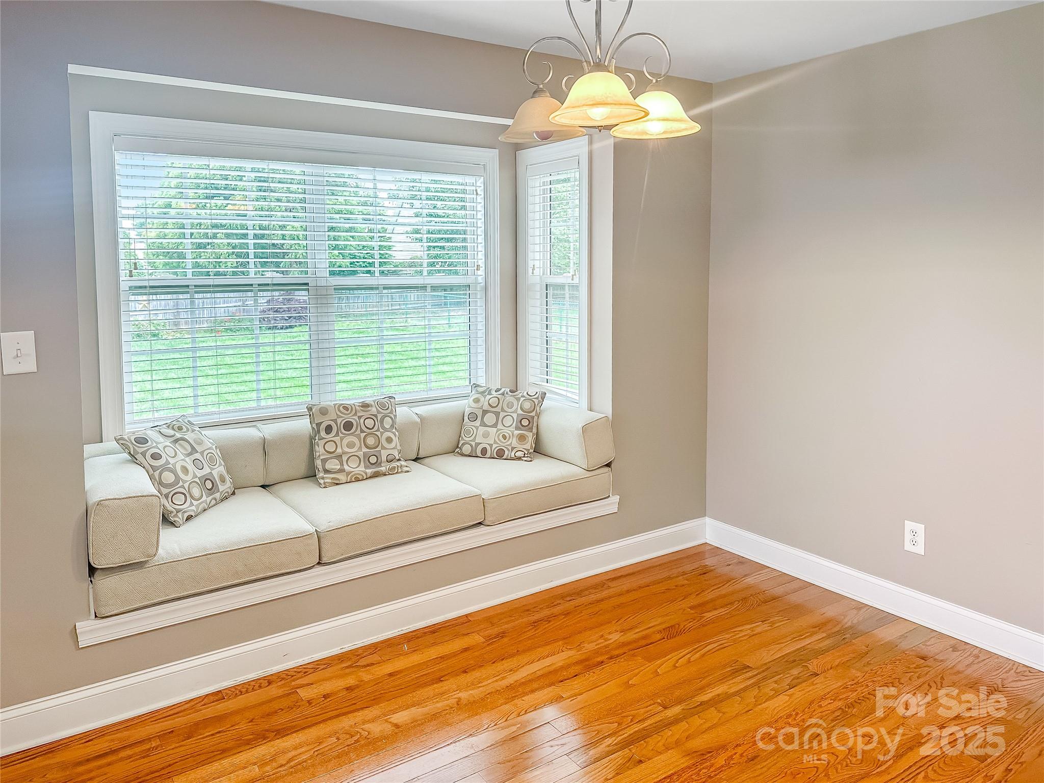 1625 Damascus Circle Conover, NC 28613 - Photo 5 of 40 a living room with furniture and a chandelier