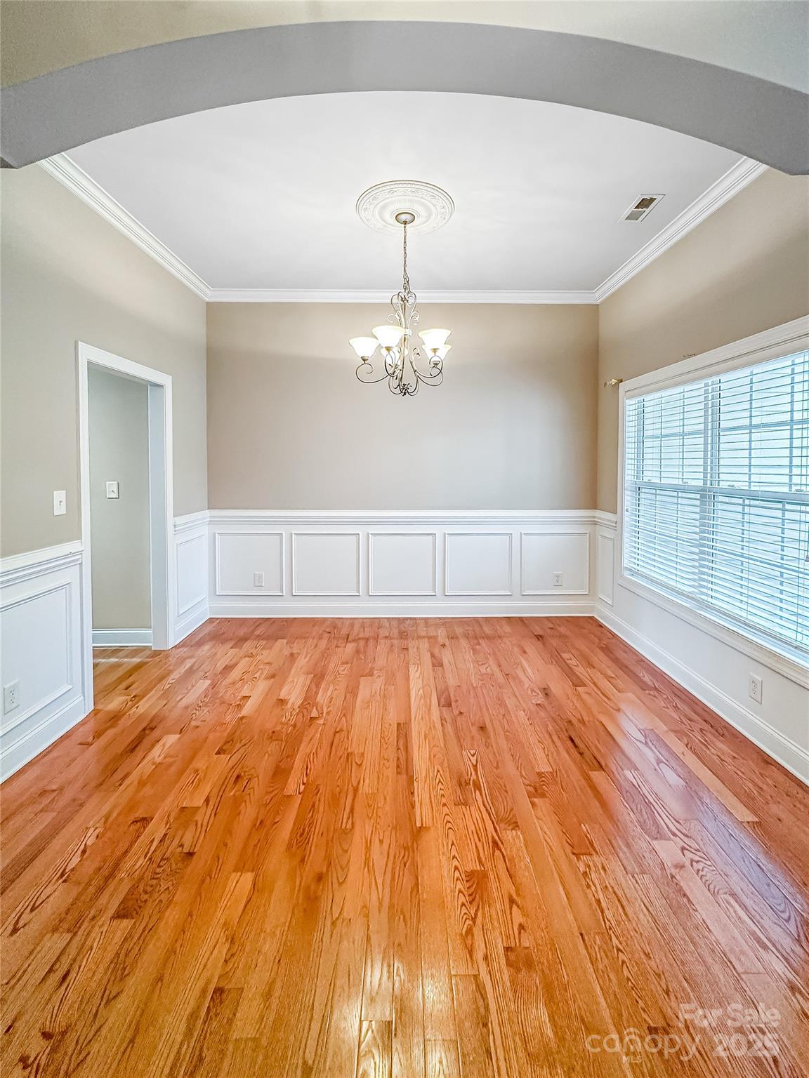 1625 Damascus Circle Conover, NC 28613 - Photo 8 of 40 wooden floor in an empty room with a window