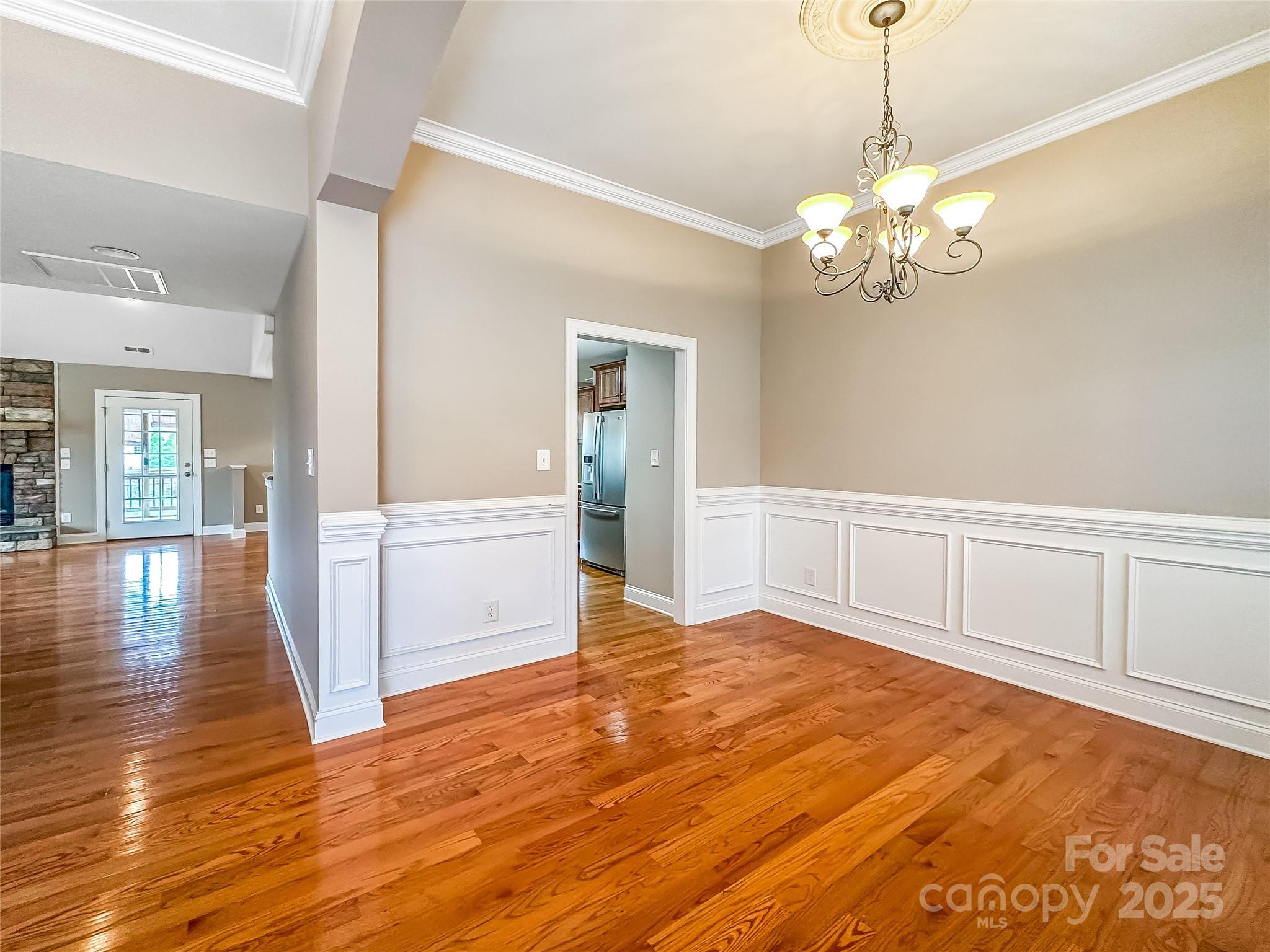 1625 Damascus Circle Conover, NC 28613 - Photo 10 of 40 a view of an empty room with wooden floor