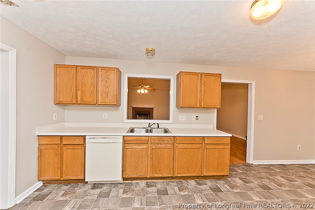 406 Kernstown Road Raeford, NC 28376 - Photo 11 of 22 a utility room with a sink washer and dryer
