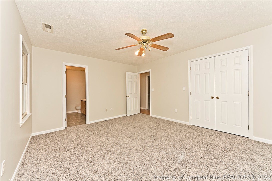 406 Kernstown Road Raeford, NC 28376 - Photo 18 of 22 a view of a big room with carpet