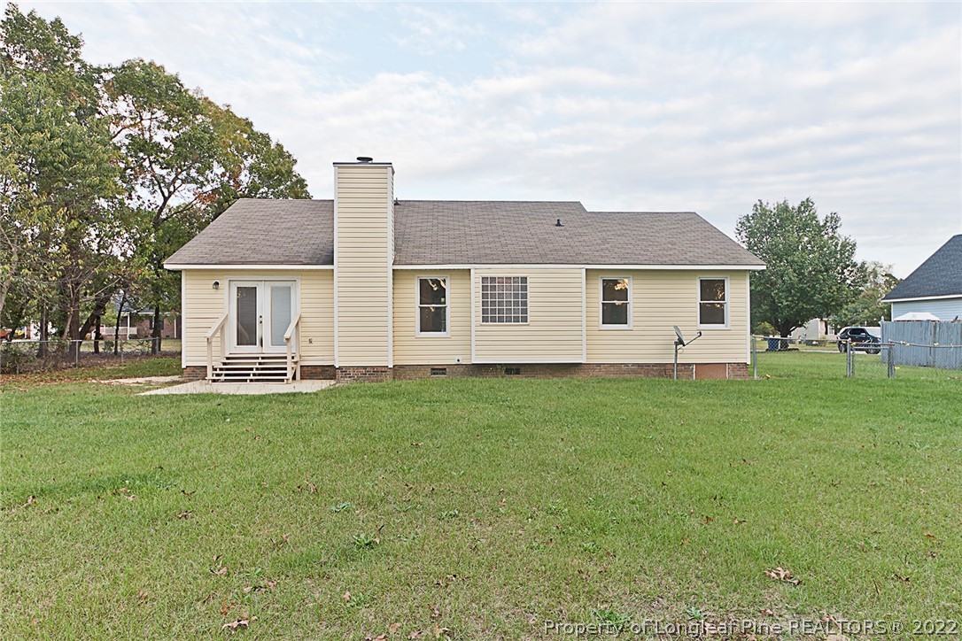 406 Kernstown Road Raeford, NC 28376 - Photo 22 of 22 a front view of a house with a garden