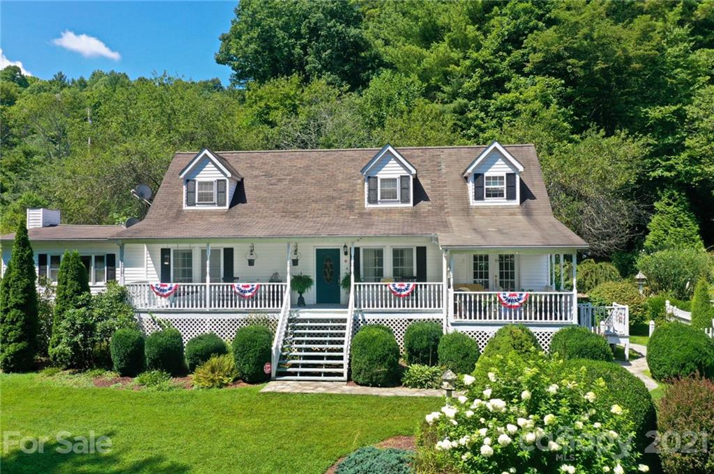 5424 Castle Ford Road Boone, NC 28607 - Photo 2 of 48 front view of house with a yard