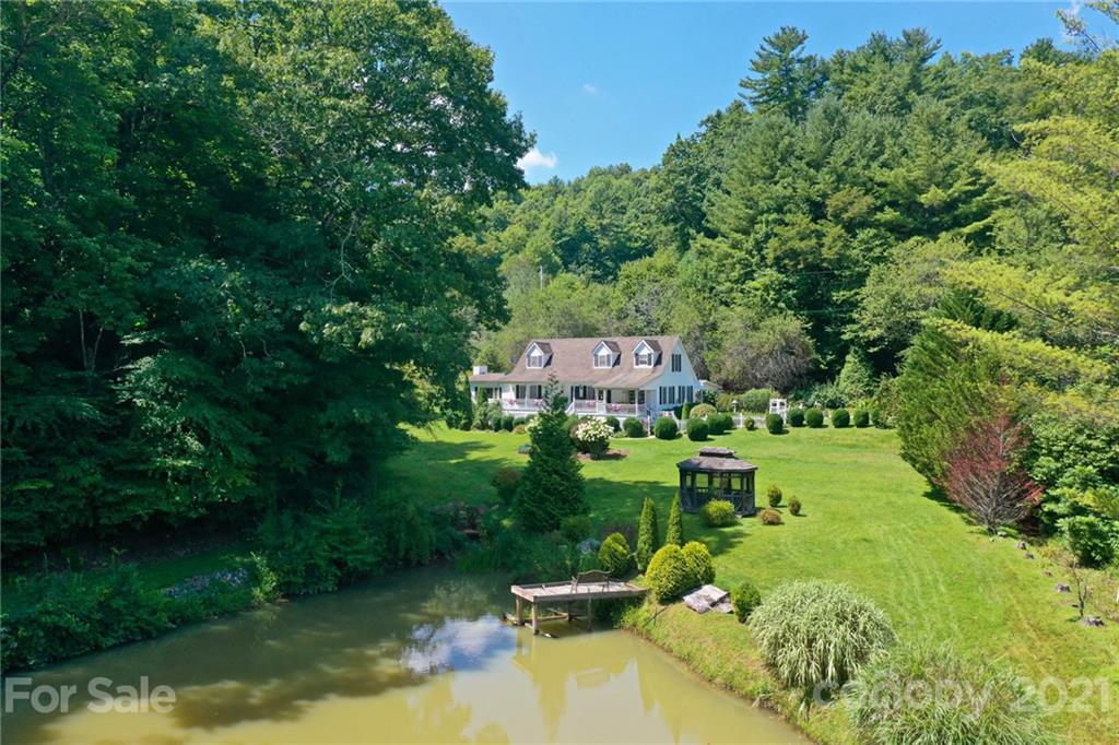 5424 Castle Ford Road Boone, NC 28607 - Photo 15 of 48 a view of a house with a yard