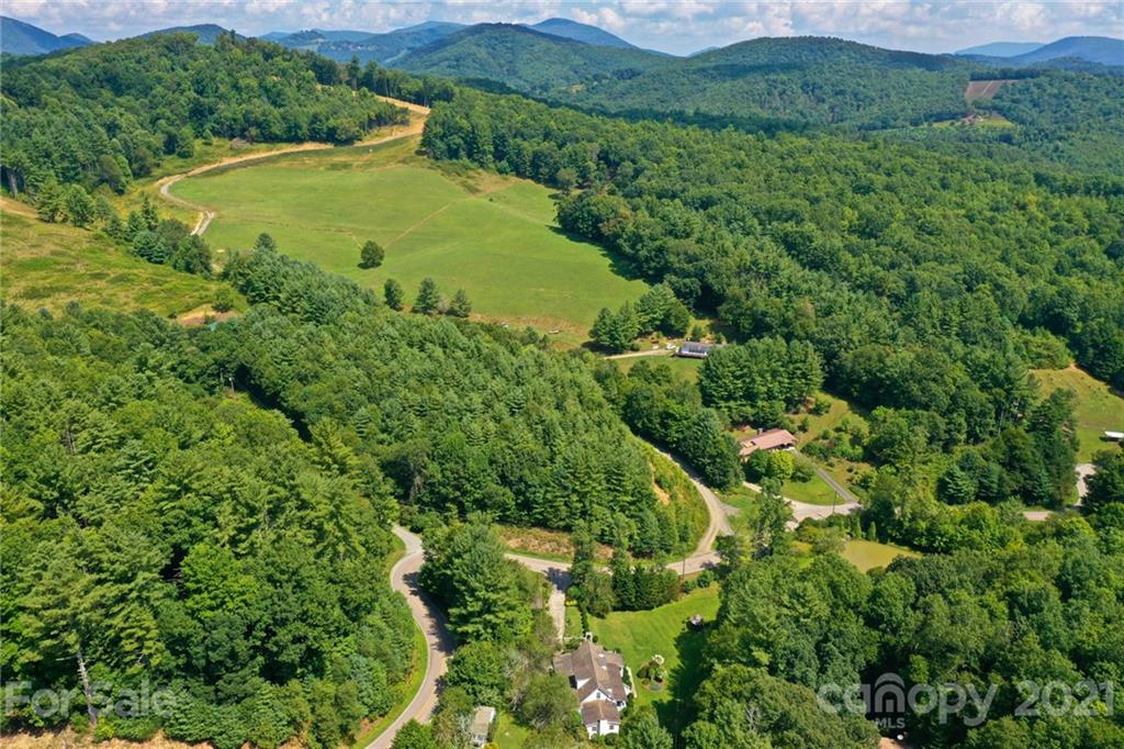5424 Castle Ford Road Boone, NC 28607 - Photo 16 of 48 an aerial view of a residential houses with outdoor space and trees all around