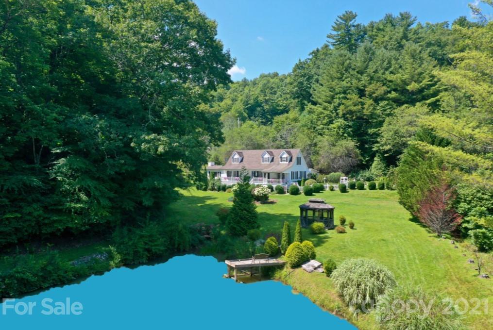 5424 Castle Ford Road Boone, NC 28607 - Photo 17 of 48 a view of a house with a yard
