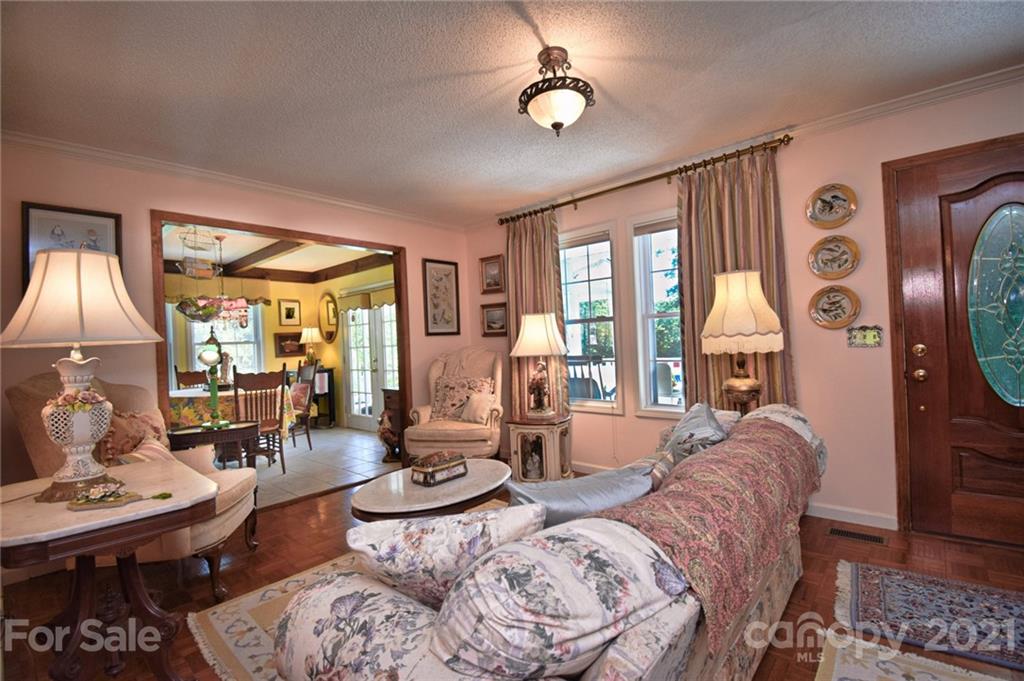 5424 Castle Ford Road Boone, NC 28607 - Photo 20 of 48 a living room with furniture fireplace and a large window