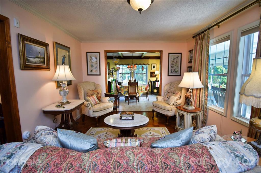 5424 Castle Ford Road Boone, NC 28607 - Photo 24 of 48 a living room with furniture and a large window