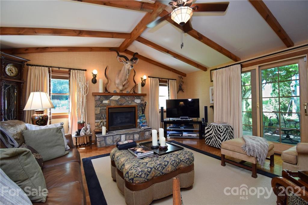 5424 Castle Ford Road Boone, NC 28607 - Photo 40 of 48 a living room with furniture and a fireplace